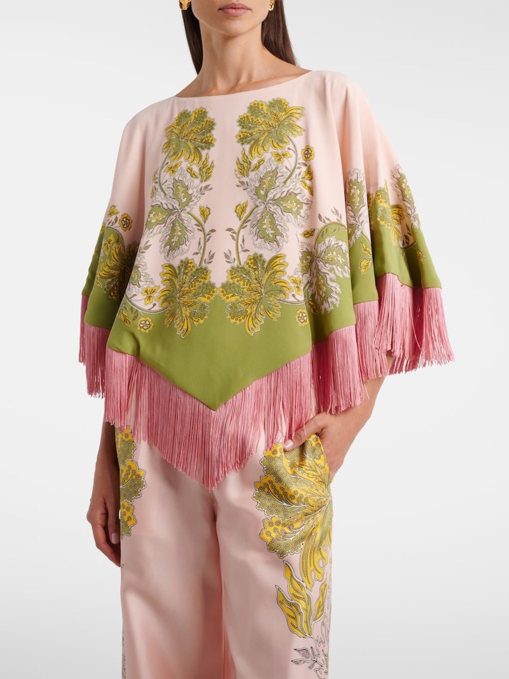 La DoubleJ reversible fringe poncho